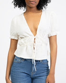 Kurze Bluse mit Schleifen
