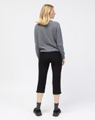 Strickjacke mit asymmetrischer Knopfleiste von hinten