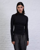 Asymmetrisches Langarmshirt mit Knöpfen