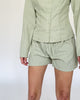 Gestreifte Shorts mit Bindebändern grün
