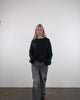 Klassischer Pullover mit Rundhalsausschnitt im Laufen