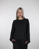 Klassischer Pullover mit Rundhalsausschnitt im Laufen